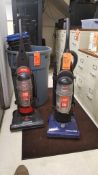 Lot contains (2) Bissell upright electric vacuum cleaners and assorted waste receptacles