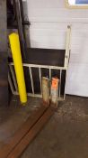 Lot contains pair of forklift forks and safety guard