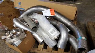 Lot of assorted exhaust pipes and clamps, etc.