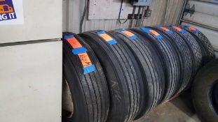 Lot of (7) Bridgestone assorted used tires with rims includes (6) 11R 22.5, and (1) 295/75R 22.5