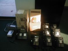 Lot consisting of ATT Merlin Legend Phone System - operators station plus (7) handsets includes PBX