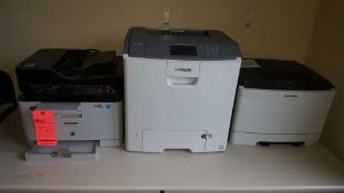 Lot of three assorted printers, one Samsung Xpress C460FW, printer, copier, scanner, fax, one Lexmar