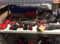Lots of assorted cordless Milwaukee tools etc., including one circular saw, two saws all's, two grin