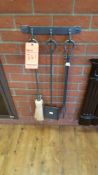 One 3 piece set of fireplace tools.