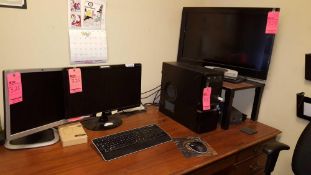 PC Unit with 3 assorted flatscreen monitors, computer tower, keyboard, and mouse.
