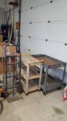 Lot includes two two-wheel hand trucks and two assorted Shop carts one plastic one metal