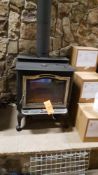 Harmon, model TL 2.6, serial number 008-350-0059, free-standing wood stove, 69300 BTUs, 85.5% effici