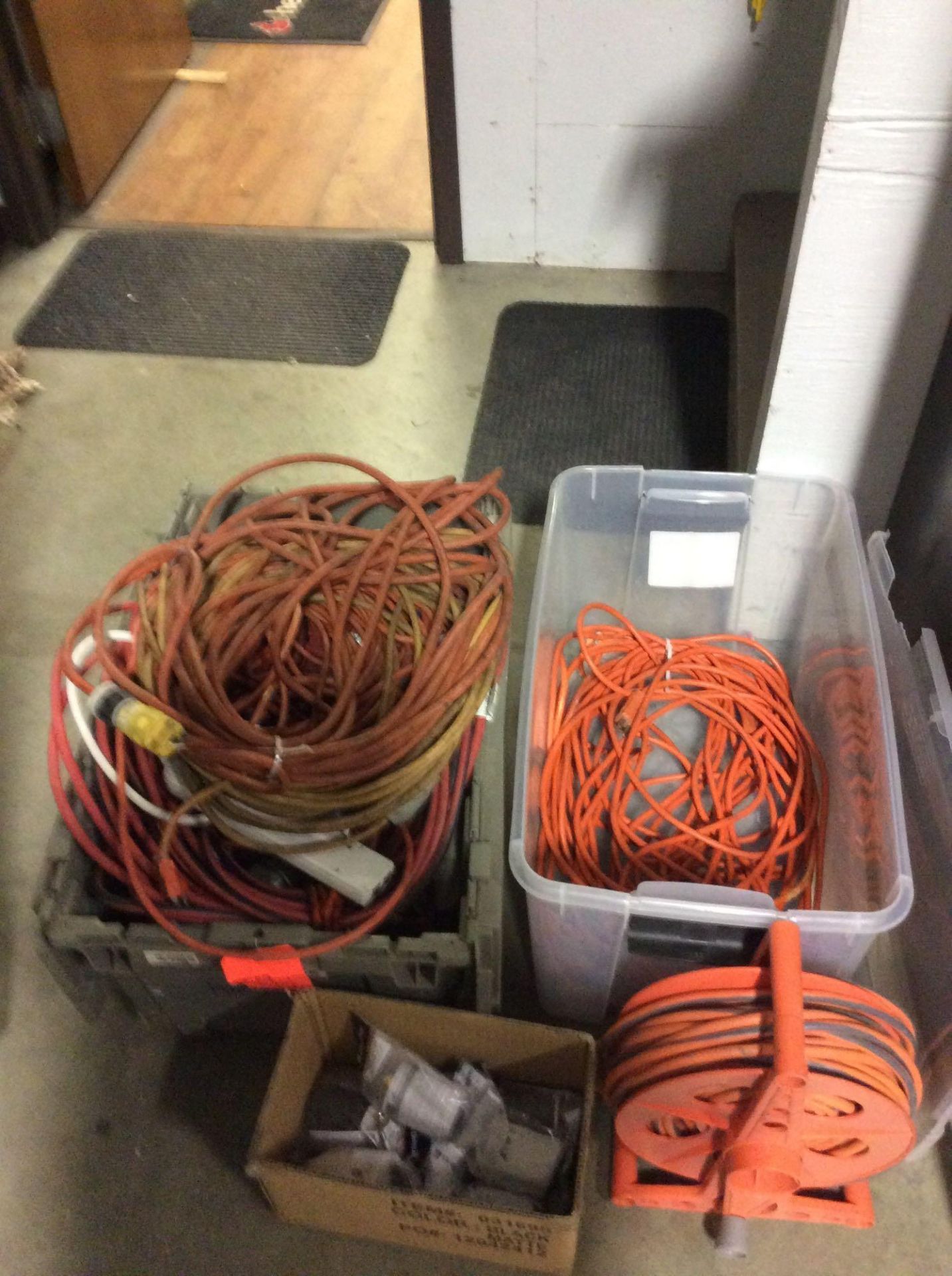 Lot of assorted electrical extension cords, drop cords, wire, fittings etc, with cabinet.