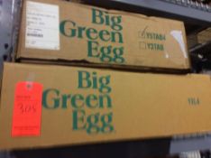 Lot of two assorted Big Green Egg tables, with casters. New in box