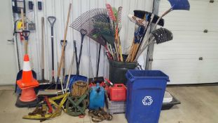 Lot of assorted yard tools including rakes, shovels, roof rakes, snow shovels, brooms,(2) wheel barr