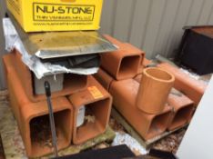 Lot of assorted clay flue tiles.