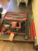 Hilti model TE52 rotary hammer drill with case and assorted bits