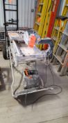 Ridgid wet saw, with portable stand, model.and serial unavailable.