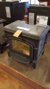 Hearthstone, model Phoenix wood stove, serial number 18059, 60000 BTUs, 75% efficient, 2.2 cubic foo