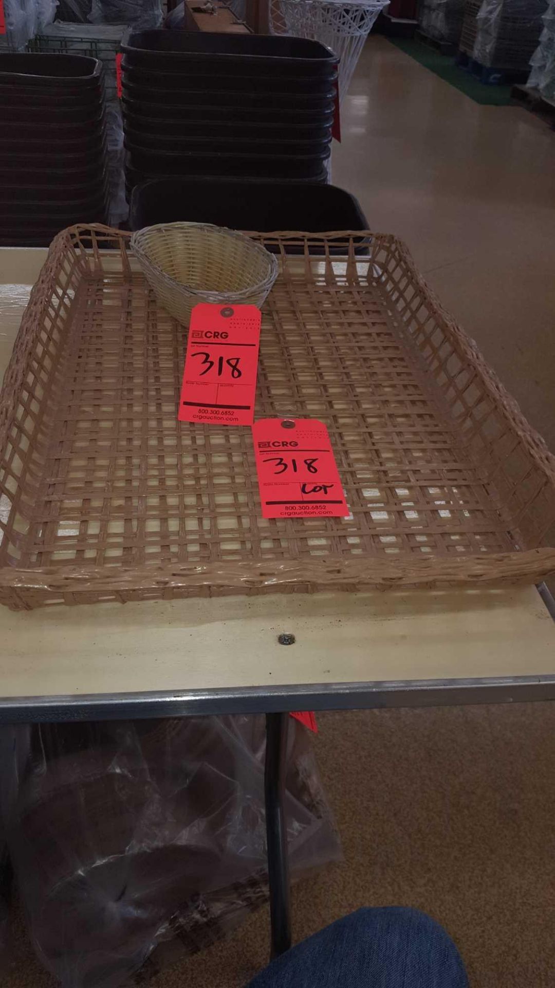 One lot of 2 wicker basket trays, 18 inch by 26 in, and 35 oval bread baskets.