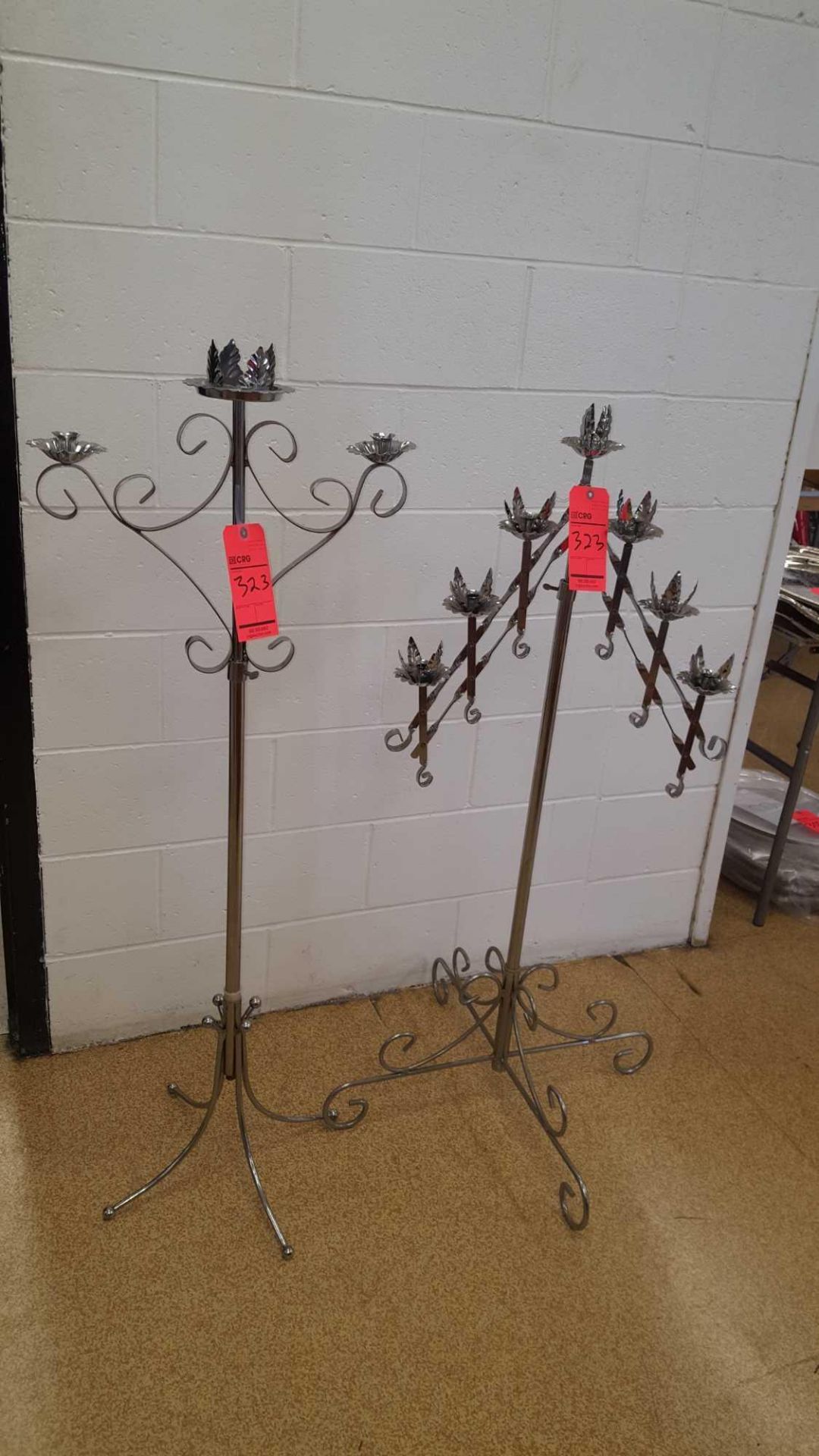 Lot of (4) assorted candelabras including (1) 7 light floor, (1) 3 Light Unity, both chrome