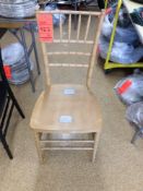 Lot of (80) Chiavari natural wood colored chairs