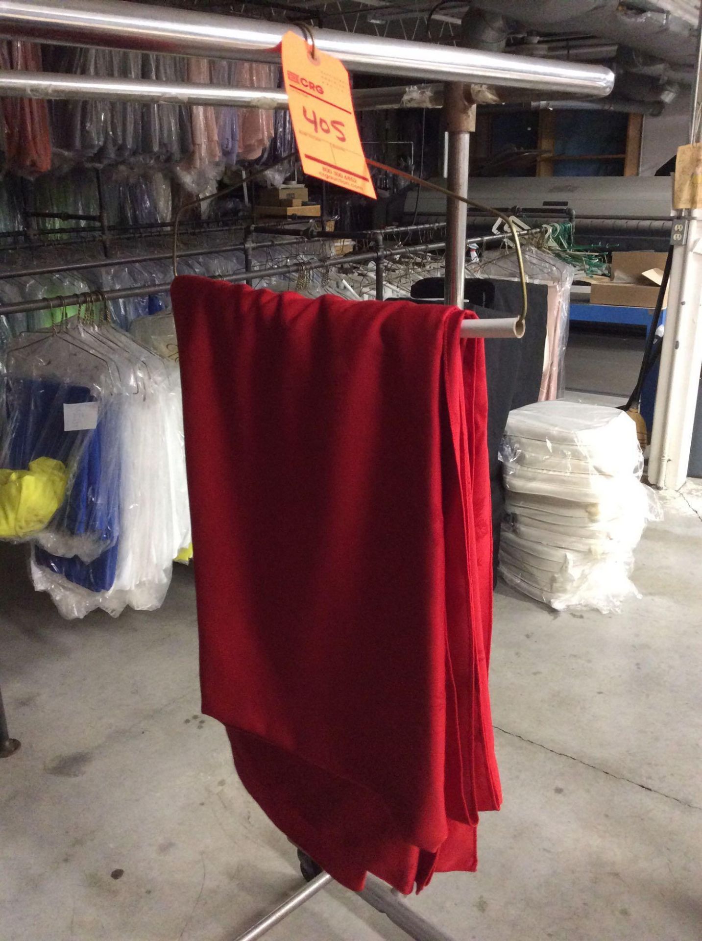 Lot of assorted red damask linens including: (24) 54" x 120"; (10) 54" x 54"; (7) 90" x 132"; (9)