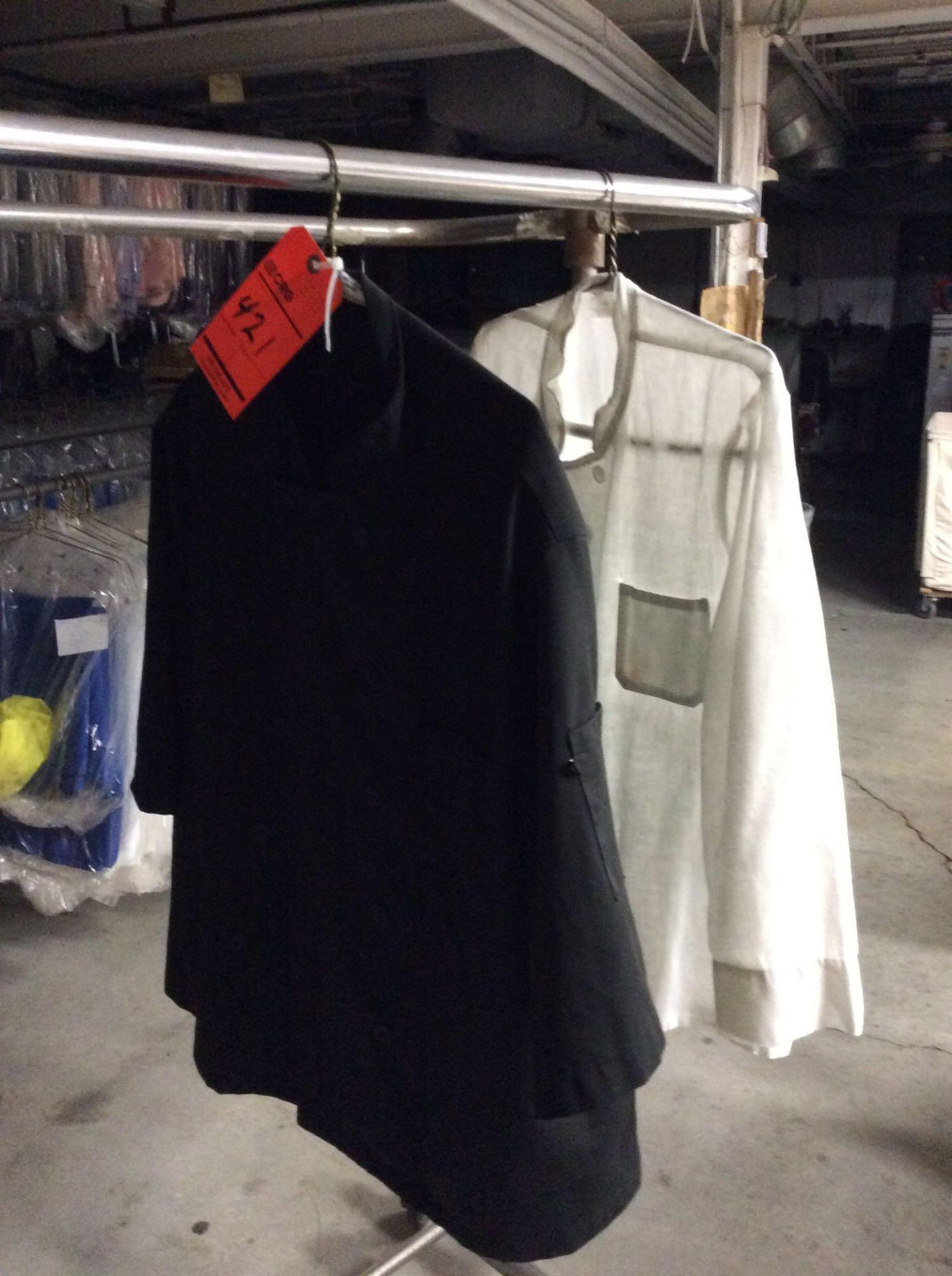 Lot of assorted chef coats including: (1) White Size 40; (7) White Size 42; (5) White Size Large; (