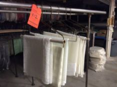 Lot of assorted tablecloths including: (7) 54" x 54" white with satin organza; (13) 54" x 54"