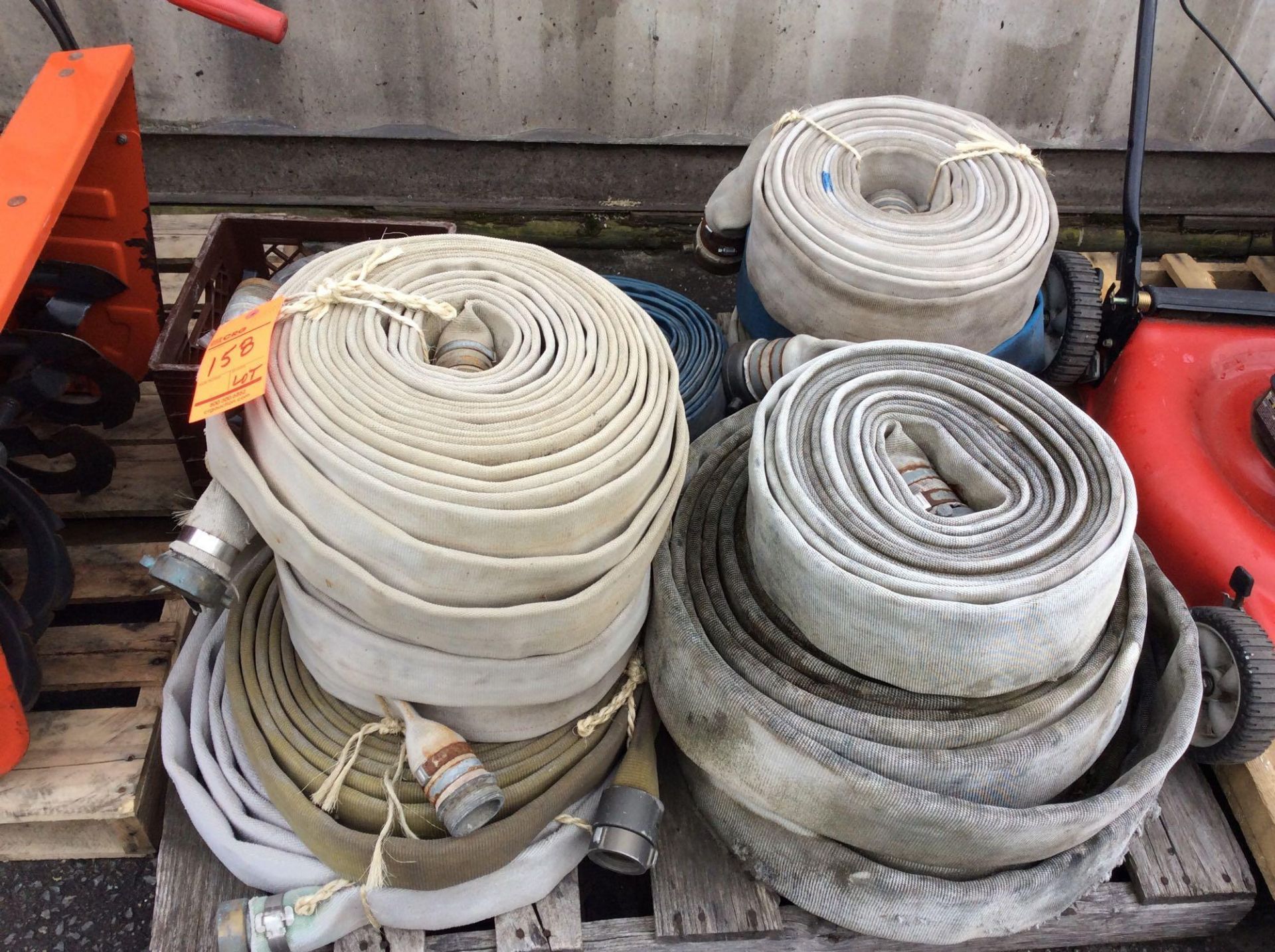 Lot of asst water hose, contents of skid