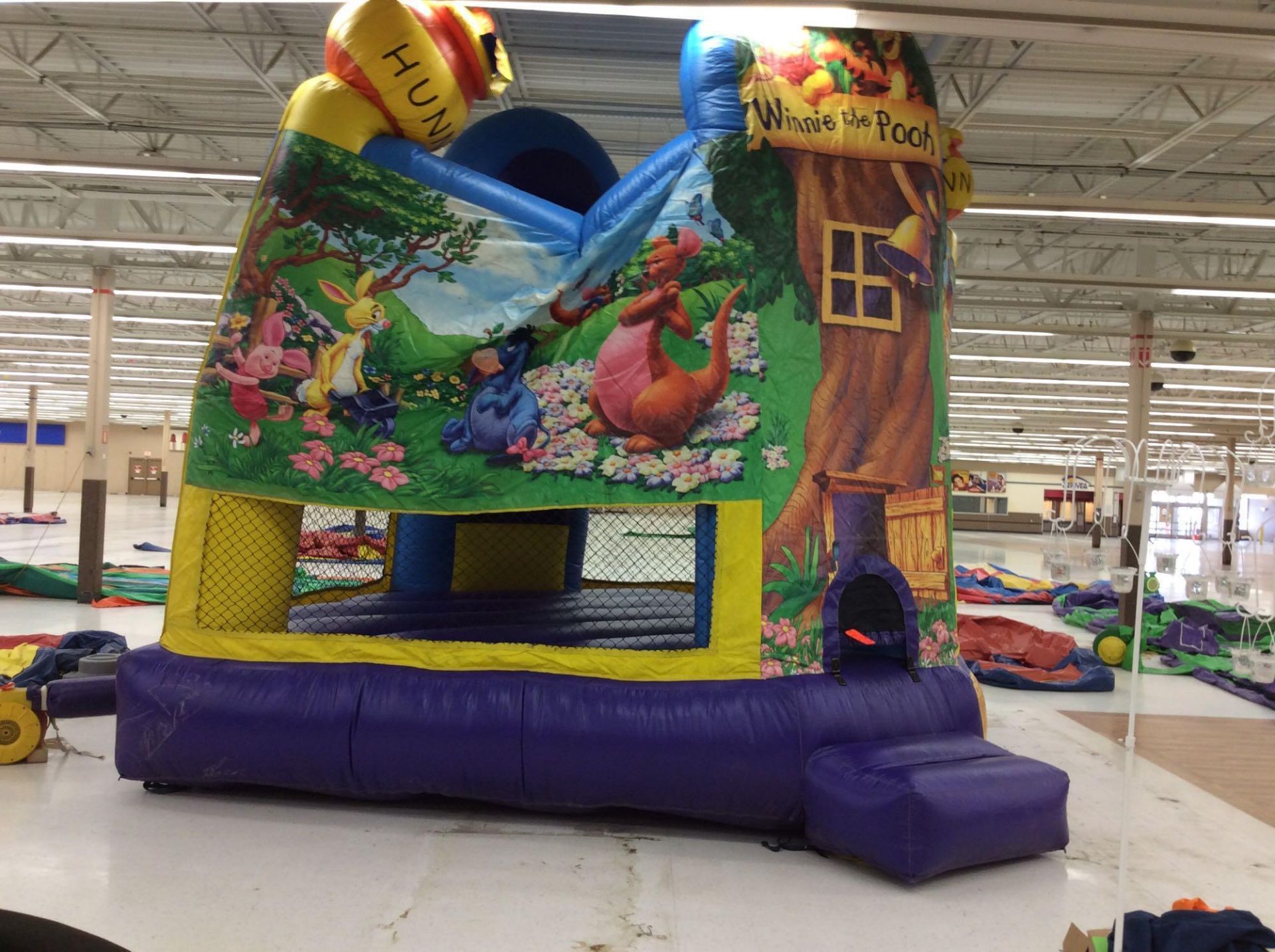 15' x 15' inflatable "Winnie the Pooh" bounce house, with blower.