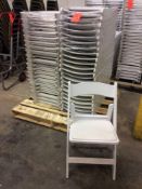 Lot of (43) white resin folding chairs on a pallet