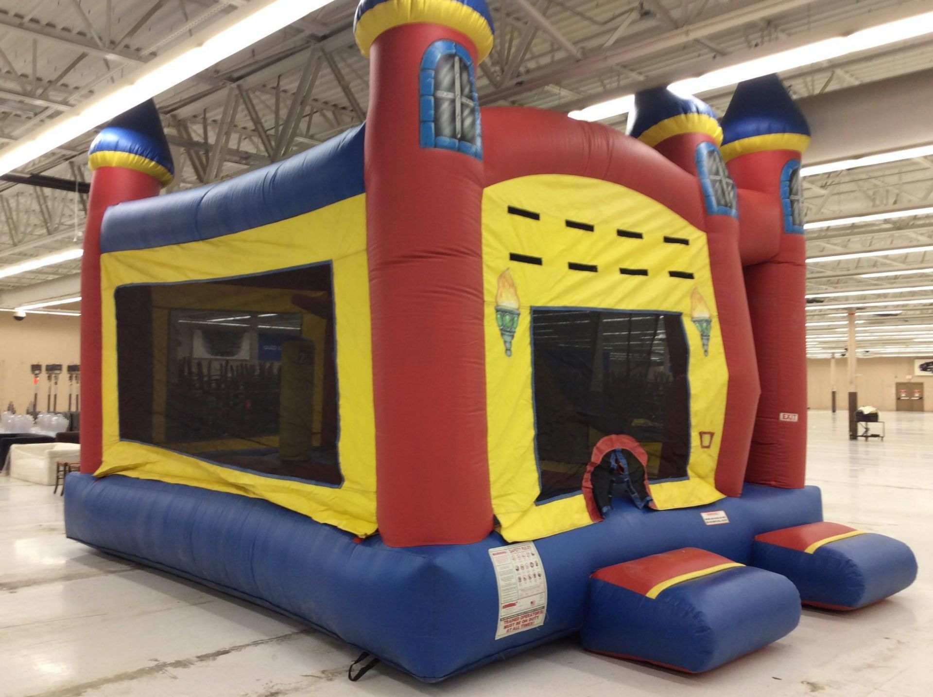 Inflatables.com brand 5-in-1 inflatable bounce with blower, approx. 15' x 20' overall
