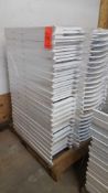 Lot of (50) assorted white resin folding chairs on a pallet