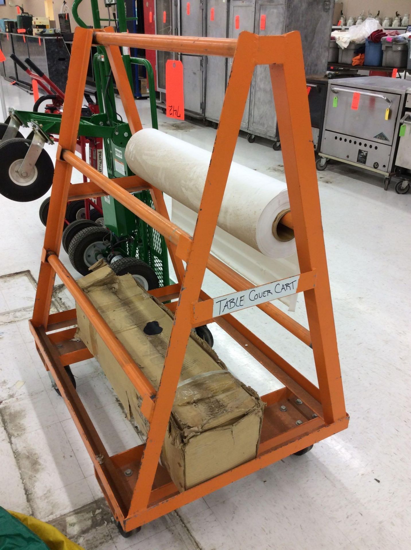 HD paper/tablecloth roll holding/dispensing pushcart with (2) rolls of table covering - Image 2 of 2