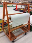 HD paper/tablecloth roll holding/dispensing pushcart with (2) rolls of table covering