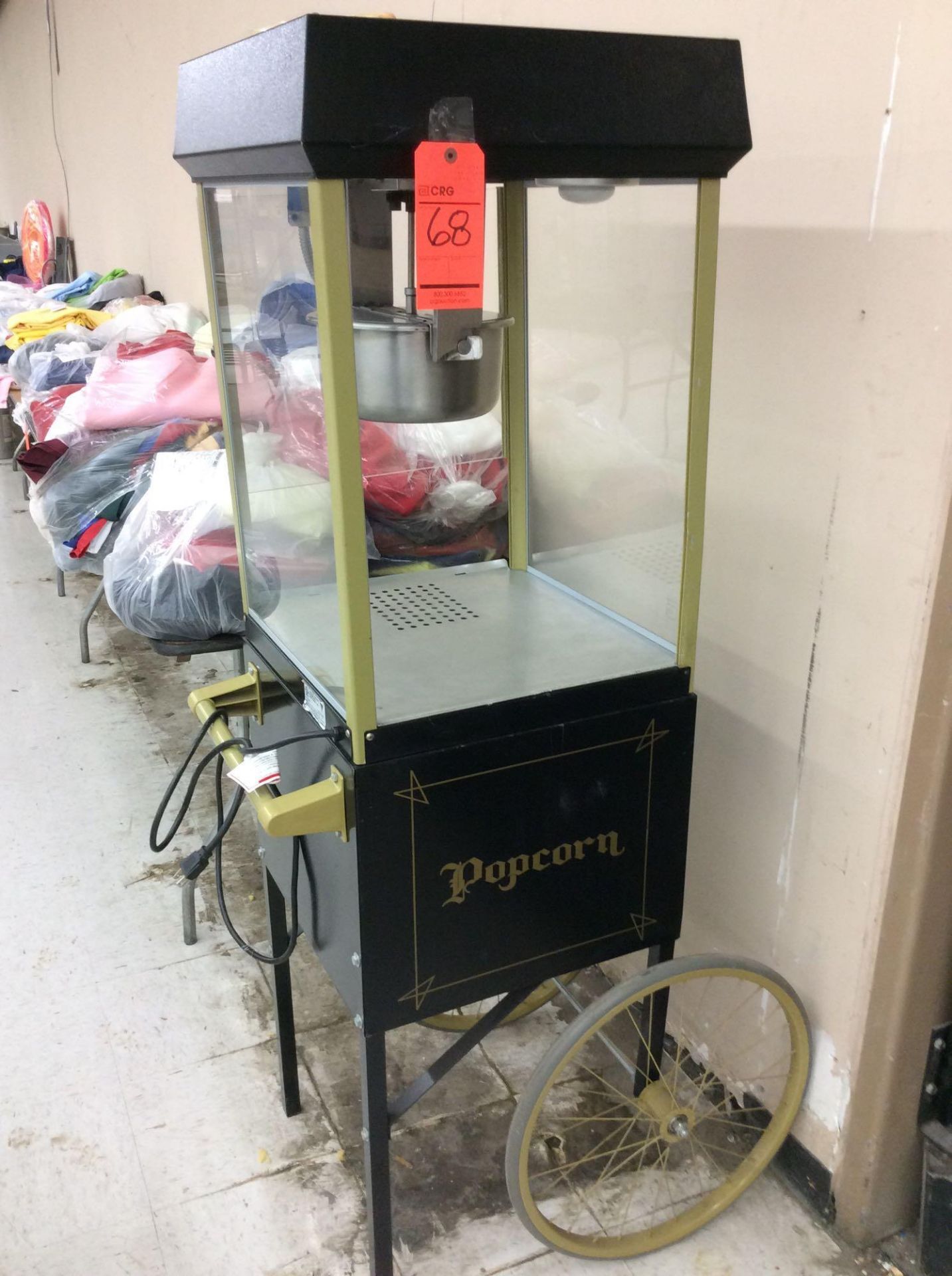 Gold Medal FunPop model 2408BKK popcorn machine on matching GM cart