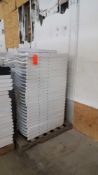 Lot of (50) assorted white resin folding chairs on a pallet