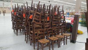 Lot of (100) brown ladder back chairs with cane seats