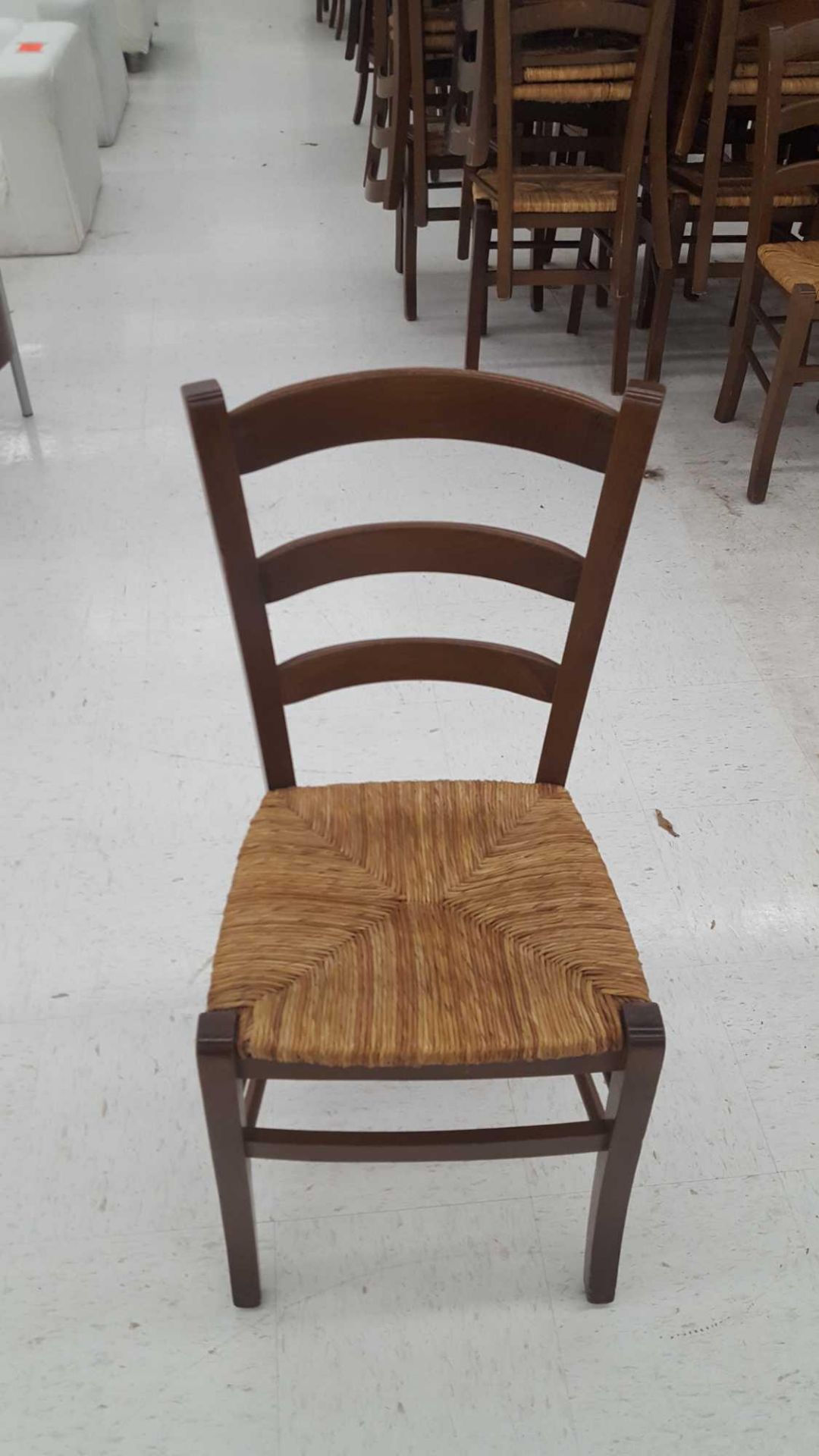 Lot of (100) assorted brown ladder back chairs with cane seats - Image 2 of 2
