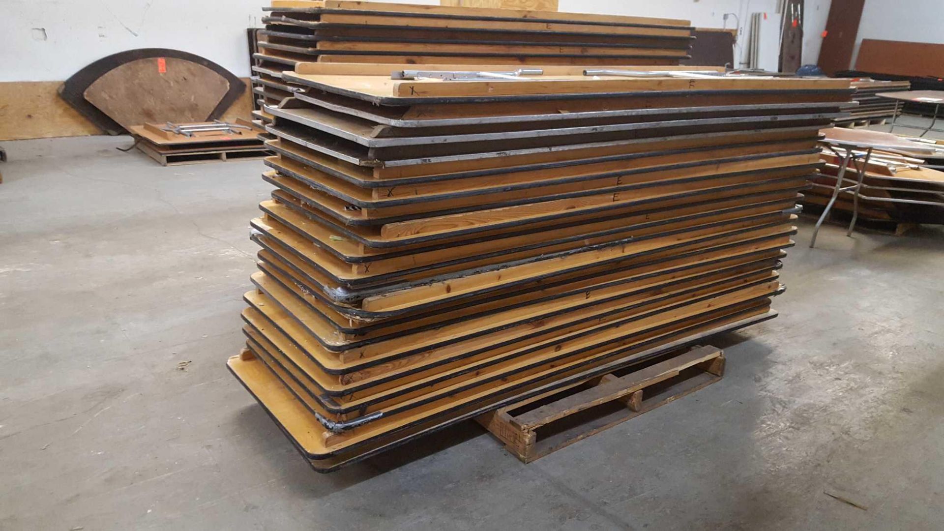 Lot of (20) assorted 8 foot by 30 inch wood tables on pallet - Image 2 of 5