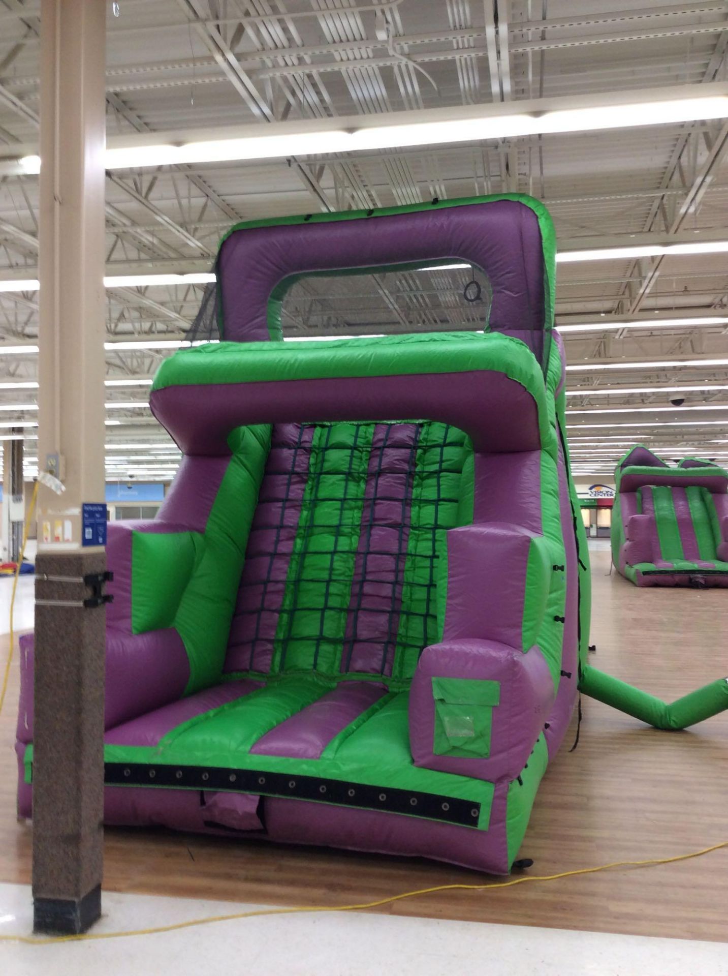 10' x25' inflatable purple and green slide with blower. Can be used in conjunction with lot 217, - Image 3 of 3