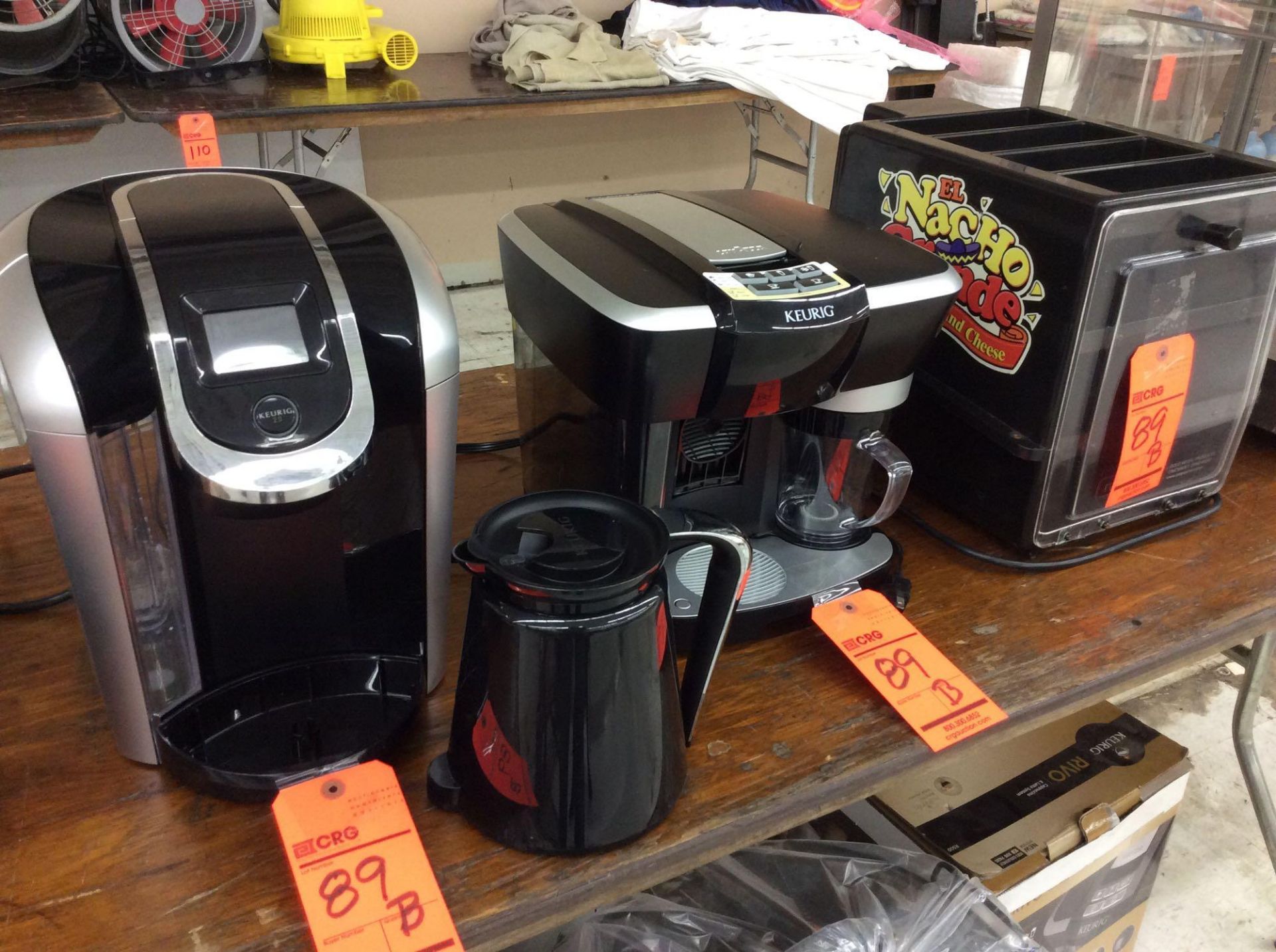 Lot - includes (1) Keurig coffee maker w/dispensing pot, (1) Keurig cappuccino/latte maker, and (