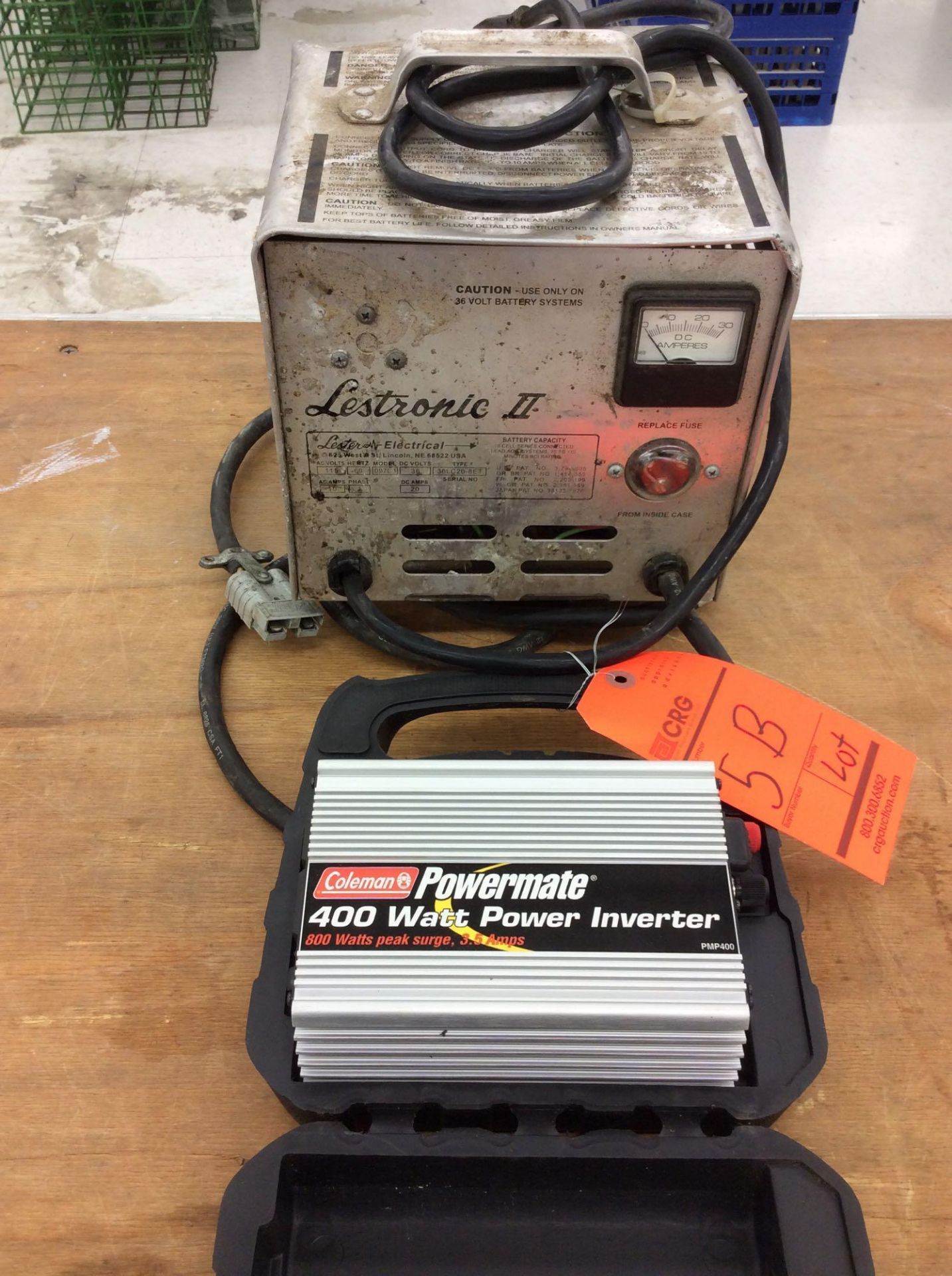 Coleman Powermate 400 watt inverter, Lectronic II golf cart charger, one pair of jumper cables,