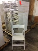 Lot of (50) white resin folding chairs on a pallet