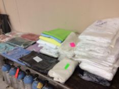 Lot of linens of table - includes asst colors/sizes of napkins and tablecloths