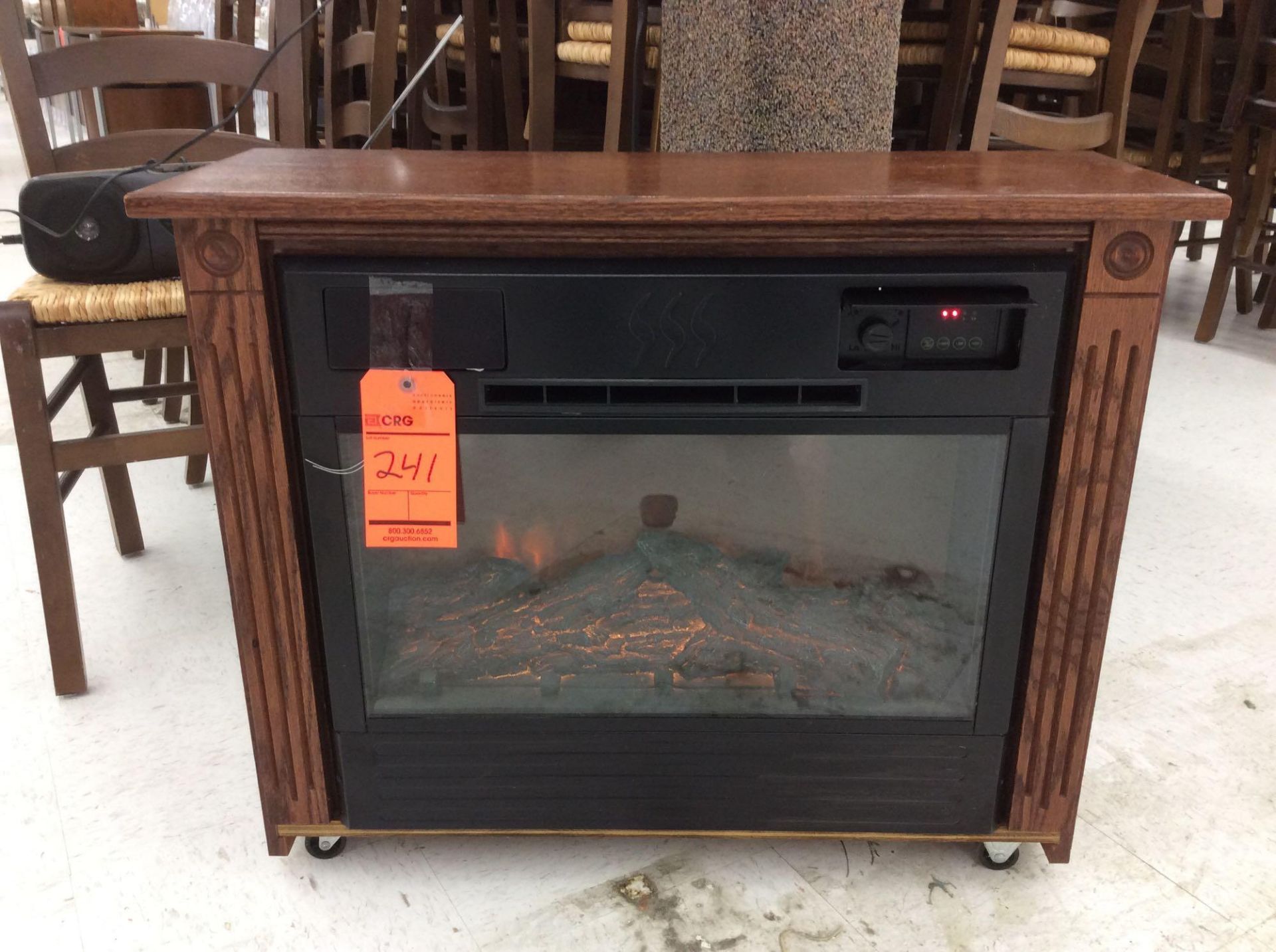 Portable fireplace with built-in heater