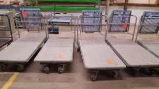 Lot of 4 assorted metal framed platform Shop carts with plastic platform and plastic basket