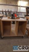 Custom portable router table with Porter-Cable router and Shop Fox feeder