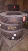 Lot of 4 assorted truck/trailer tires - mostly unused re-caps