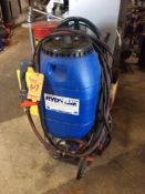 Rydlyme portable descaling dispenser with pump, mounted on 2 wheel hand truck