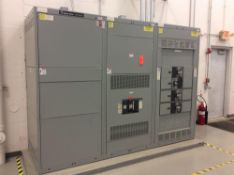 GE Spectra Series switchboard, 3 panel with (1) draw out and (4) breakers (LOCATED IN BATAVIA)