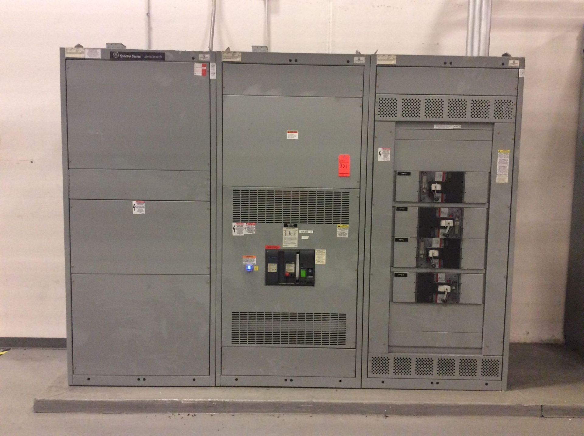 GE Spectra Series switchboard, 3 panel with (1) draw out and (4) breakers (LOCATED IN BATAVIA)