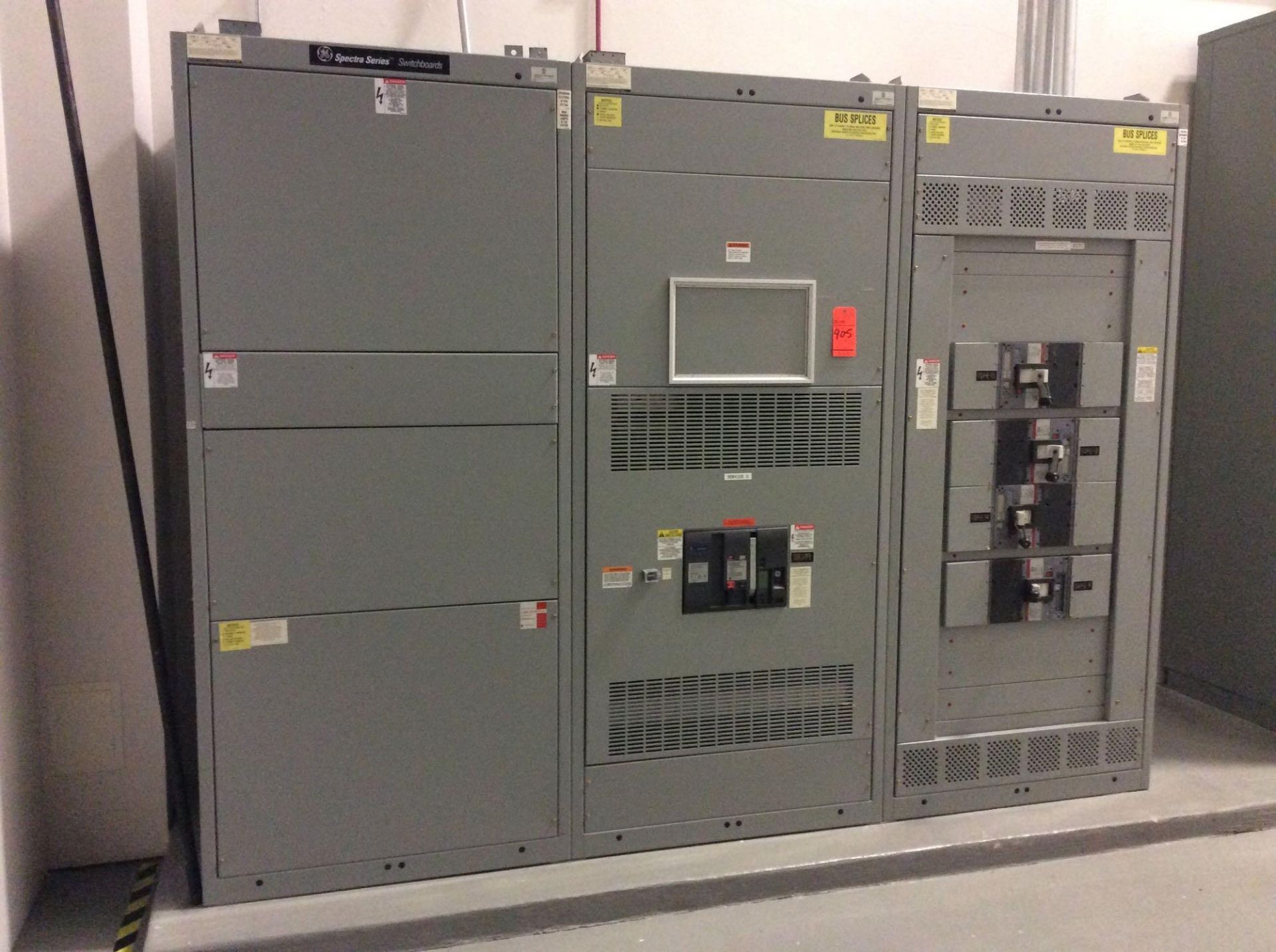 GE Spectra Series switchboard, 3 panel with (1) draw out and (4) breakers (LOCATED IN BATAVIA)