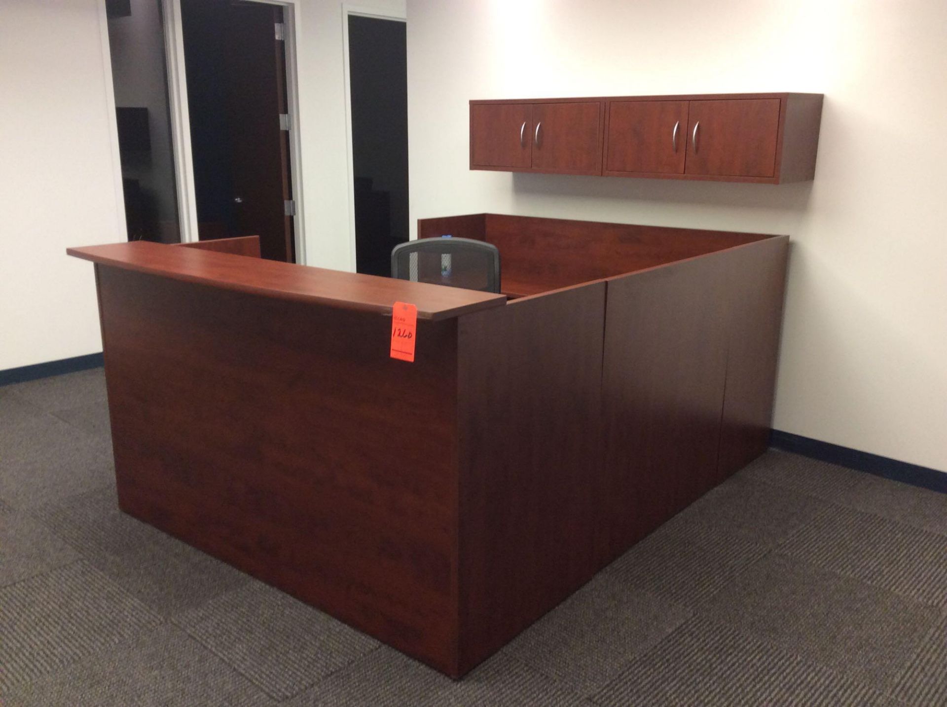 Wood U-shaped receptionist desk with over shelf, executive chair, and (3) wood arm chairs with side